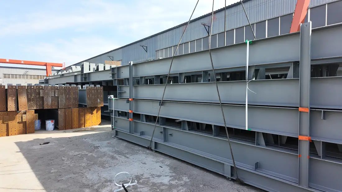 Steel members bundled and strapped for sea freight